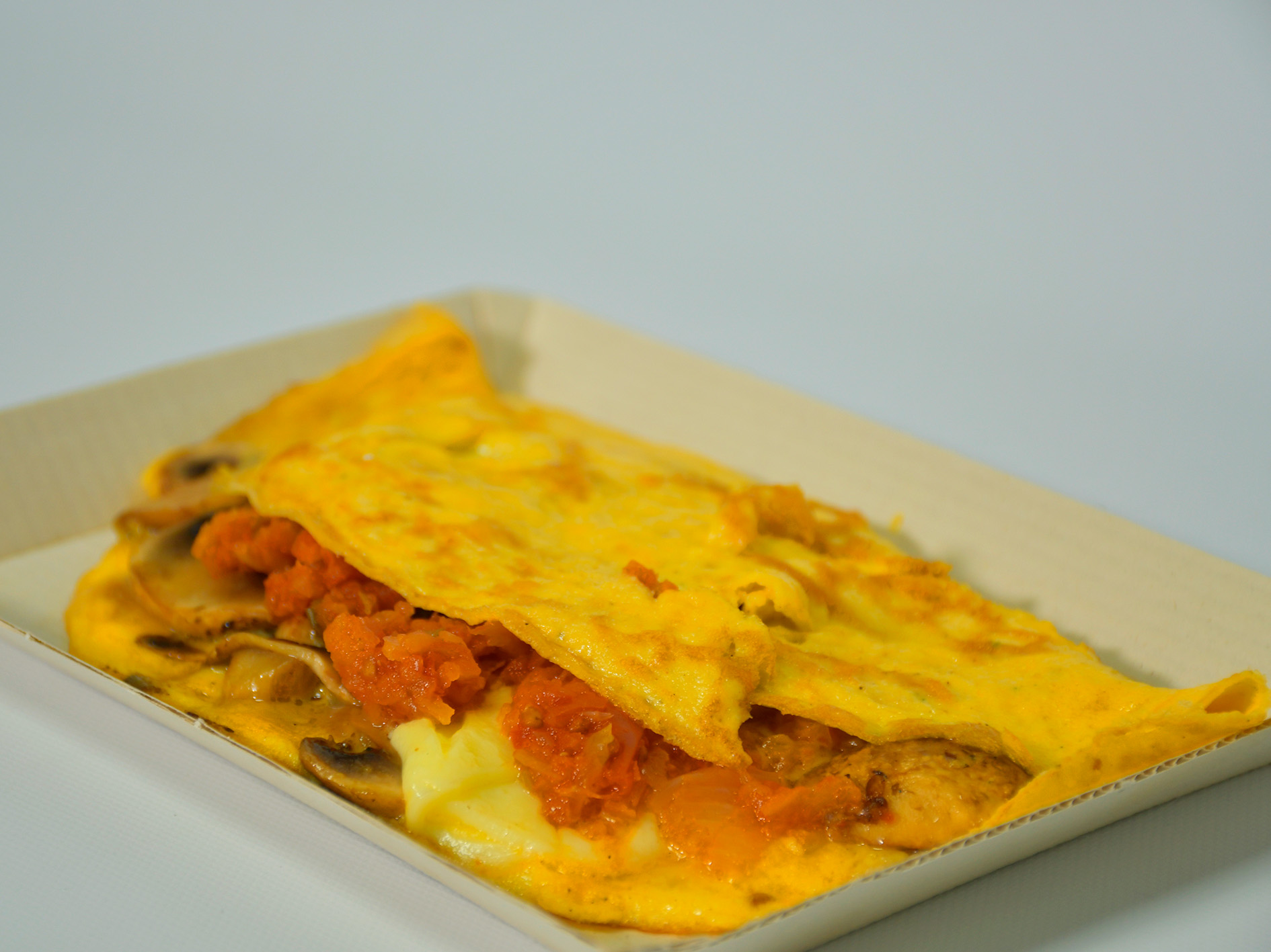 Omelet con champiñon, queso y hogao